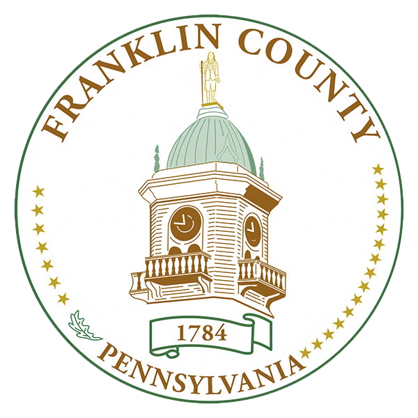 The official seal of Franklin County, Pennsylvania, featuring a clock tower, gold stars around the border, and the year 1784 on a banner.