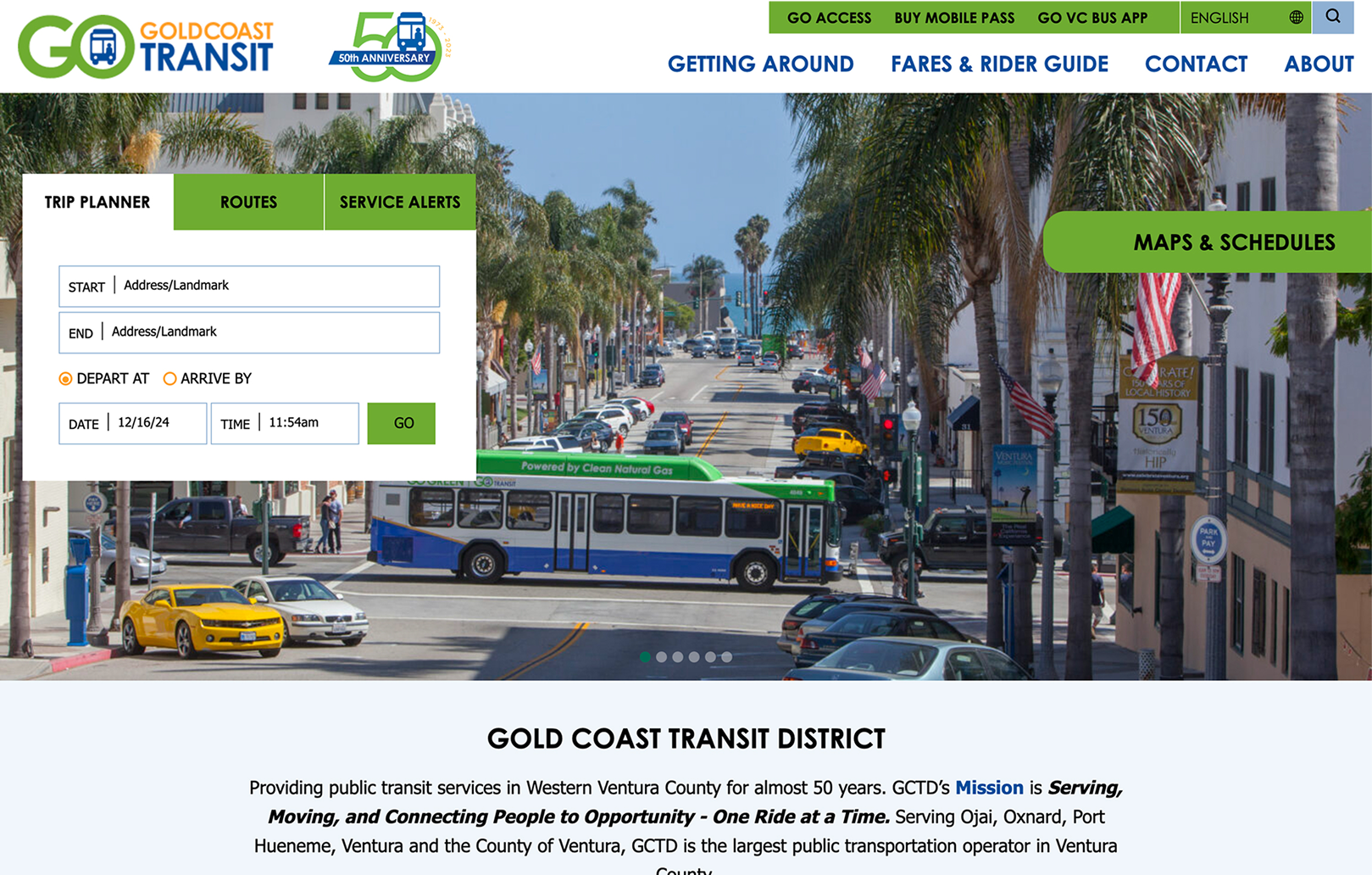A city street with a bus in the center, palm trees lining both sides, cars parked, and pedestrians walking. The Gold Coast Transit District website interface overlays the image.