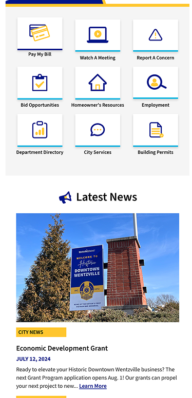 Screenshot of a city government website featuring service icons, navigation menus, and a news section about an Economic Development Grant for Historic Downtown Wentzville.